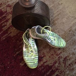 Neon green and gray Nike sneakers